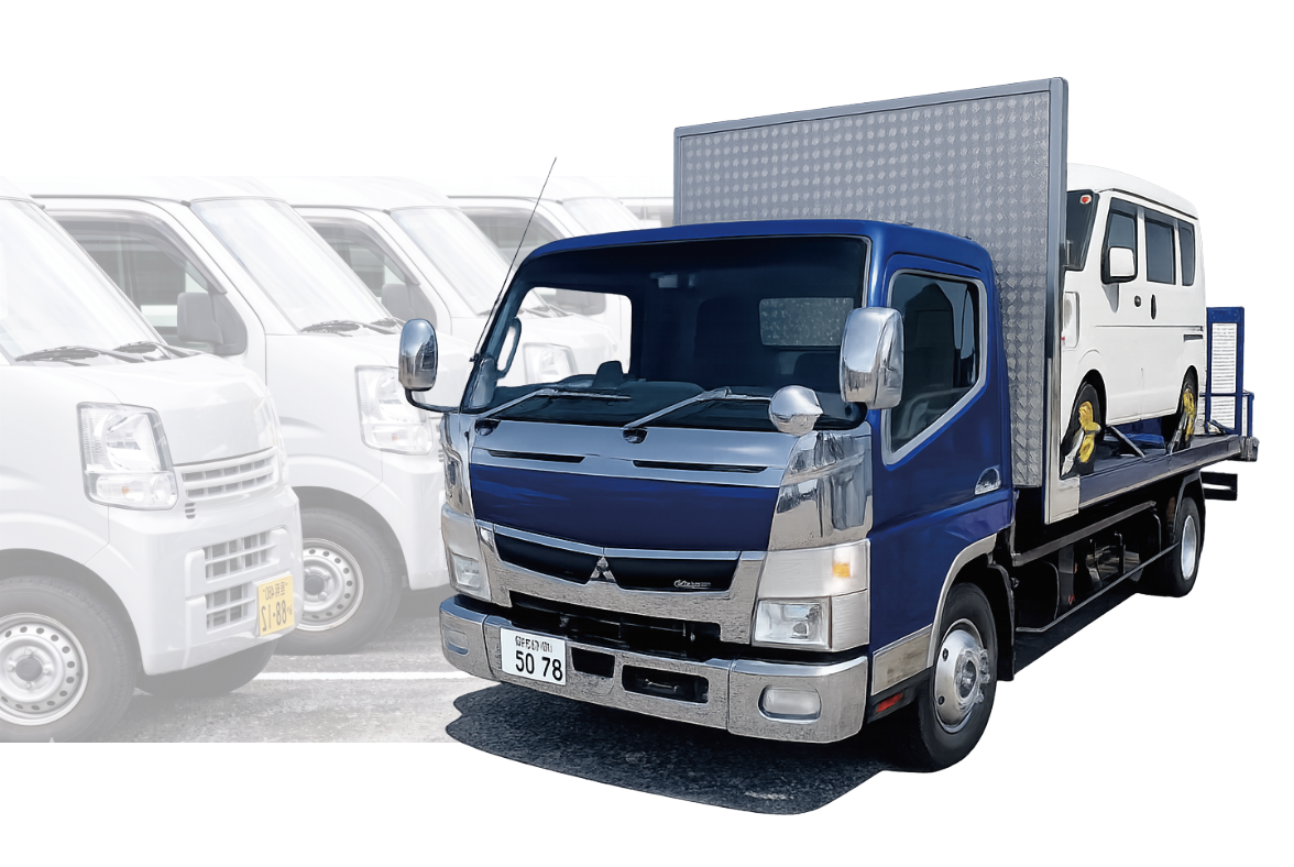 軽バンを積載したレッカー車と待機中の代車